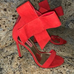 Red Betsey Johnson high heels with bow